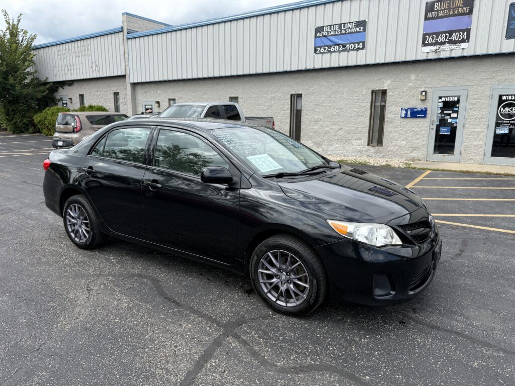2012 Toyota Corolla LE. Comes with a 12 month 12,000 mile warranty.