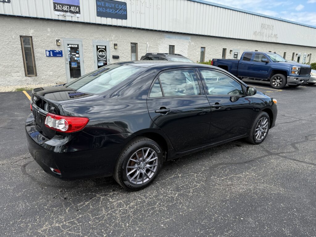 2012 Toyota Corolla LE. Comes with a 12 month 12,000 mile warranty.