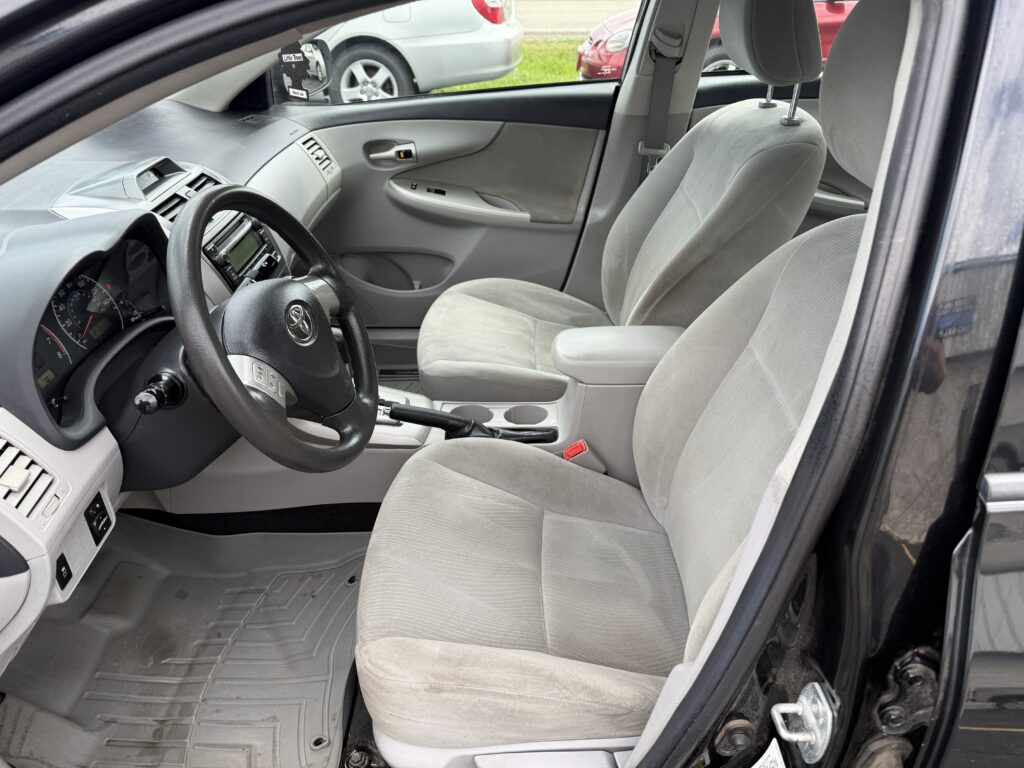 2012 Toyota Corolla LE. Comes with a 12 month 12,000 mile warranty.